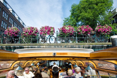 Visitors enjoying the Amsterdam Canal Cruise